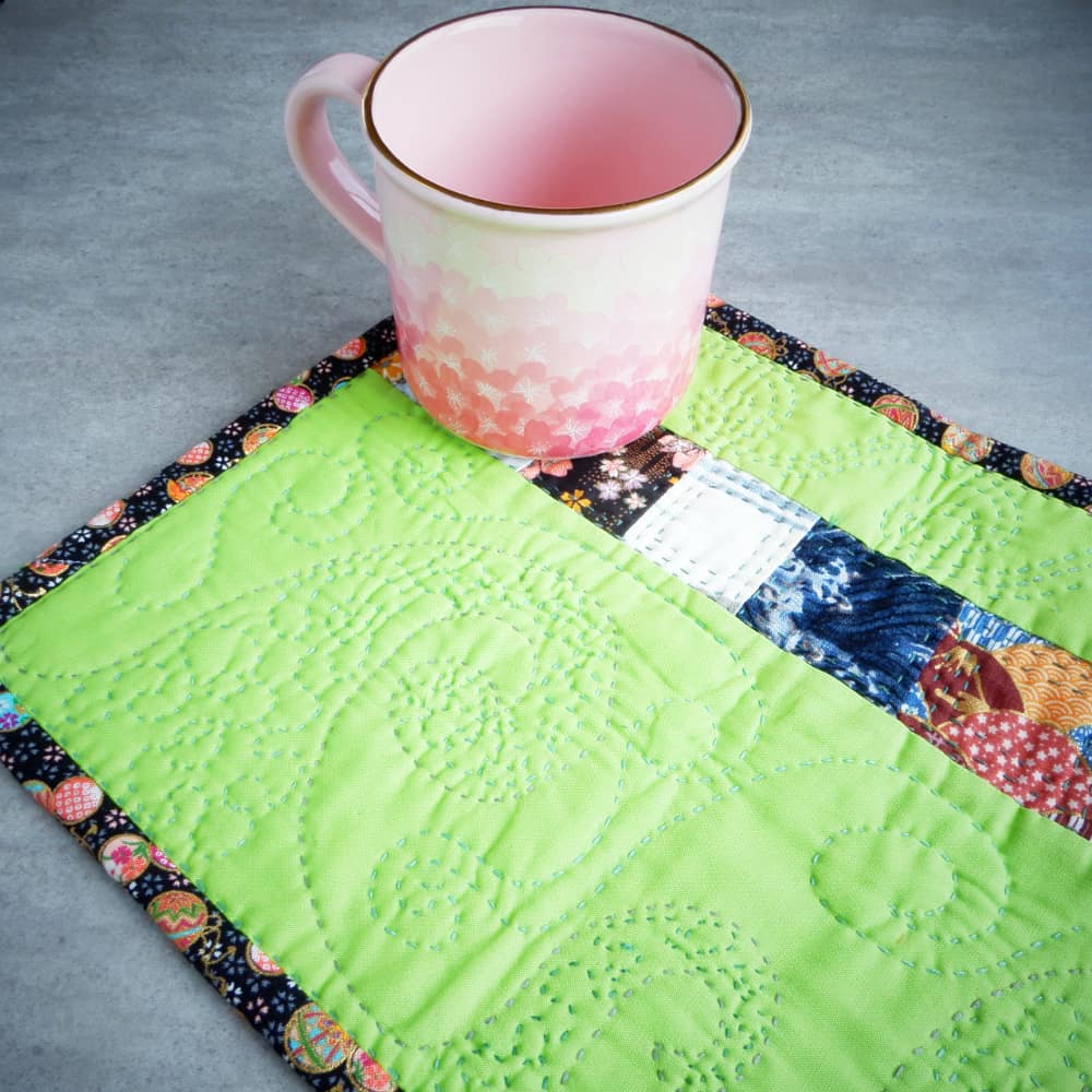 green handmade table mug rug with mug