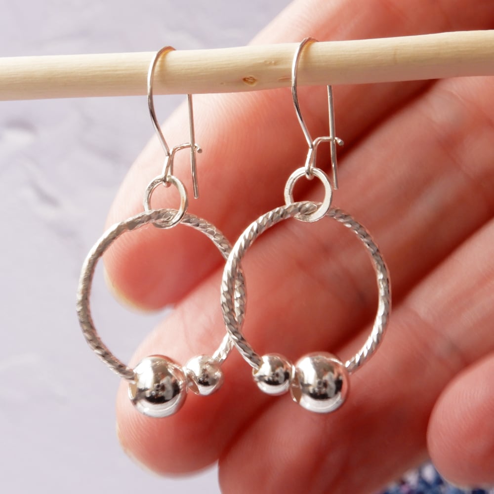 silver sensory fidget hoop earrings size