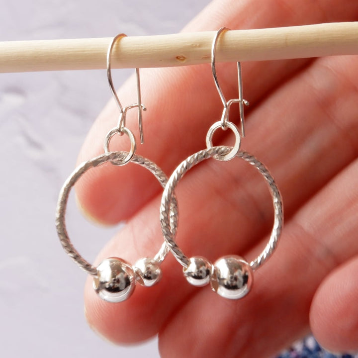 silver sensory fidget hoop earrings size