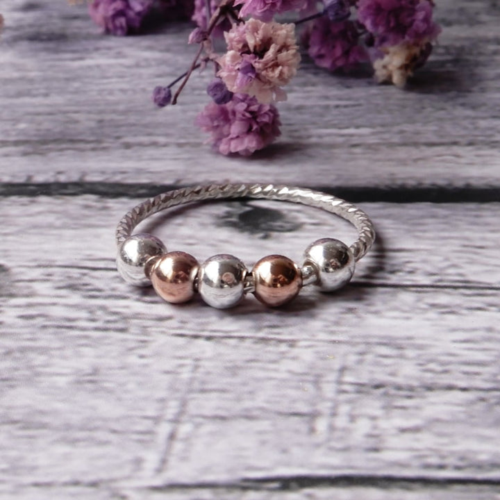 sensory fidget ring on wood background