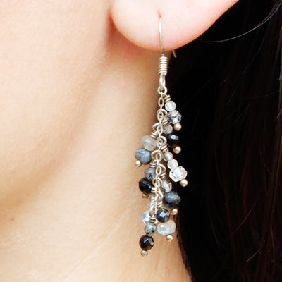 black gray gemstone silver chandelier dangle earrings on model