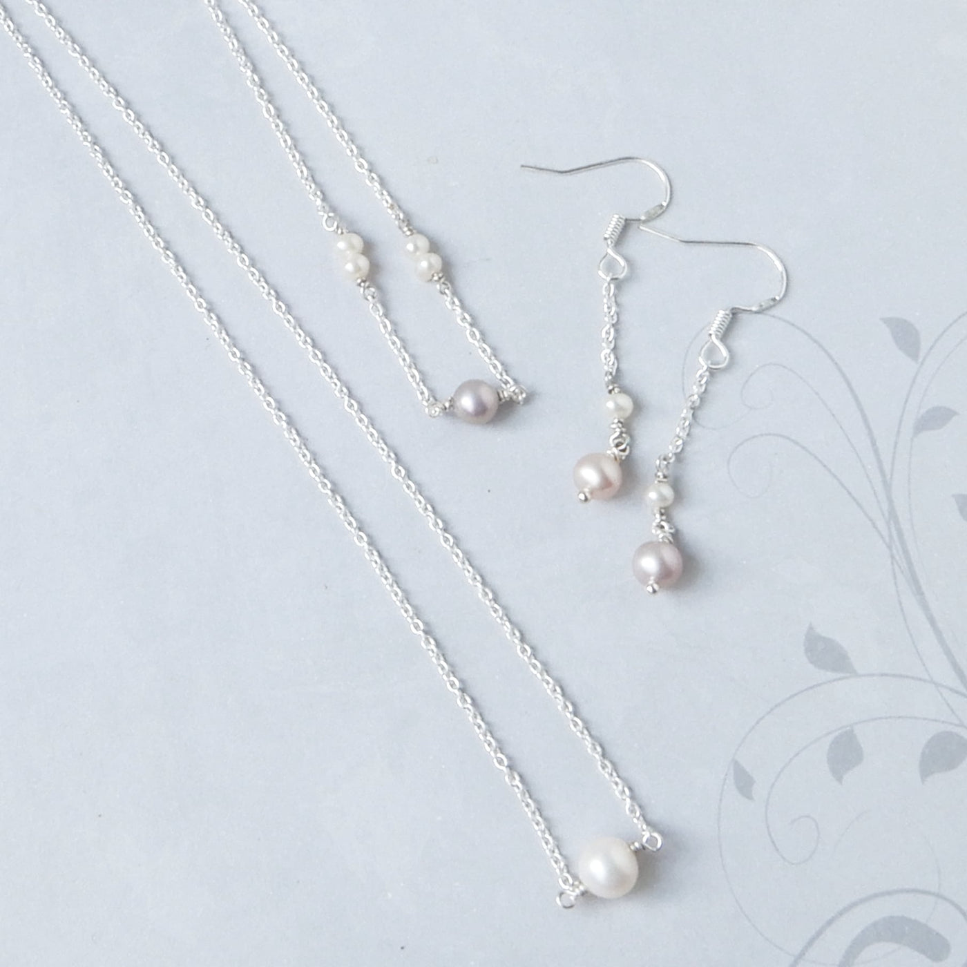 silver and pearl chain set