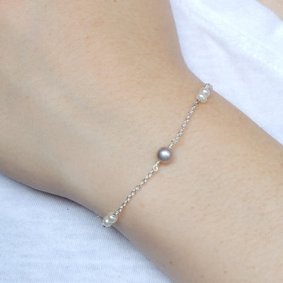 pearl and silver chain bracelet on model