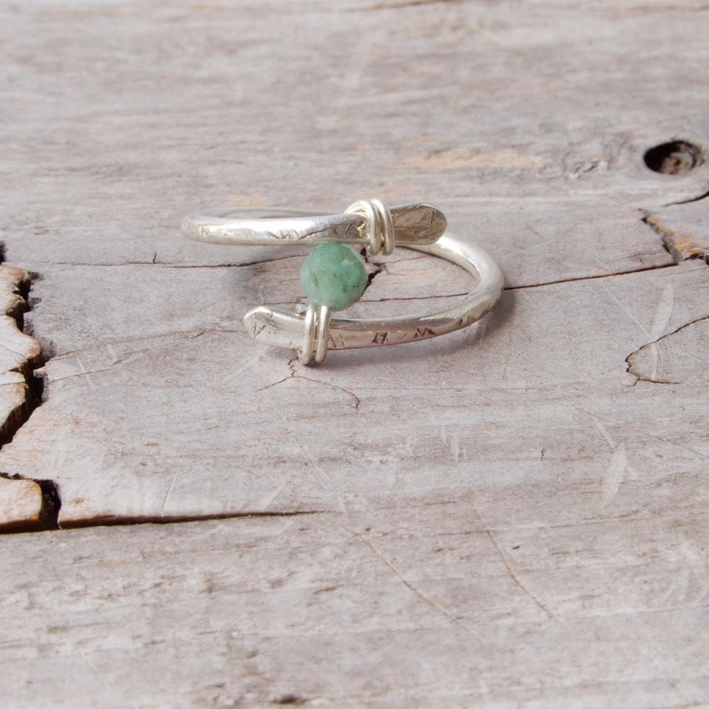 adjustable silver gemstone ring with emerald