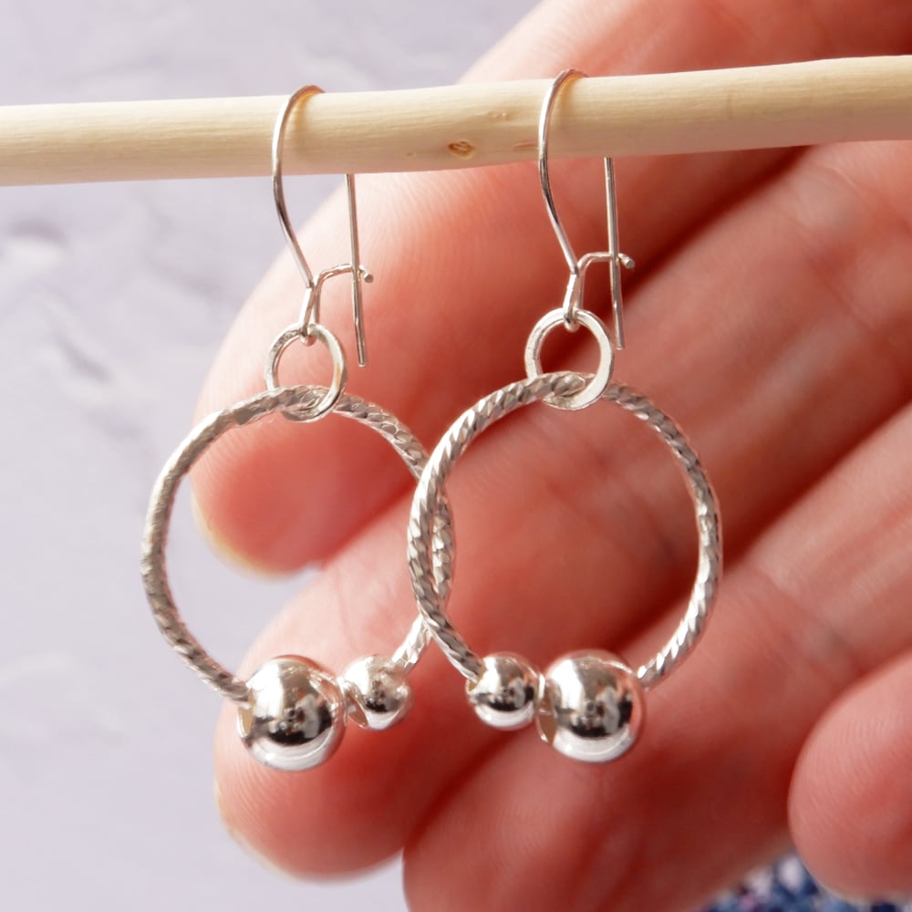 silver sensory fidget hoop earrings size 