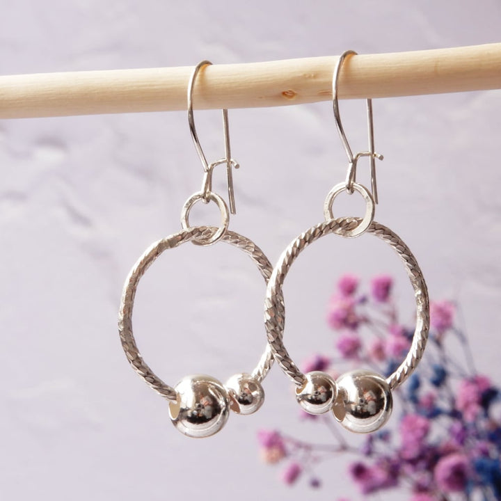 silver sensory fidget hoop earrings